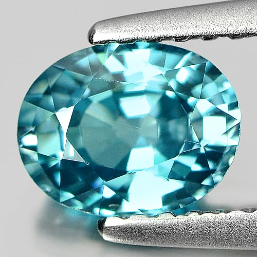 Natural Blue Zircon 1.41 Ct. VVS Oval Shape 6.9 x 5.4 Mm. Gemstone From Cambodia: Product ID: 807711132 Product Name: Natural Zircon Weight: 1.41 CT. Size: 6.9 x 5.4 x 3.7 MM. Shape: Oval Color: Blue Clarity:VVS Luster: Good Gems Origin: Cambodia Treatment: Heated Crystal Structure