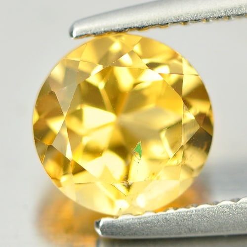 Natural Yellow Citrine 1.37 Ct. Br Shape 7.1 Mm. Gemstone From Brazil: Product ID: 801811486 Product Name: Natural Citrine Weight: 1.37 CT. Size: 7.1 x 7.1 x 5.2 MM. Shape: Round Color: Yellow Clarity:VSI Luster: Good Gems Origin: Brazil Treatment: Unheated Crystal Struc