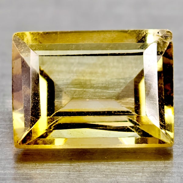Natural Yellow Citrine 1.47 Ct. Clean Baguette Shape 8.1 x 5.9 Mm Gemstone From Brazil: Product ID: 801815042 Product Name: Natural Citrine Weight: 1.47 CT. Size: 8.1 x 5.9 x 4.1 MM. Shape: Baguette Color: Yellow Clarity:If Luster: Good Gems Origin: Brazil Treatment: Unheated Crystal Str