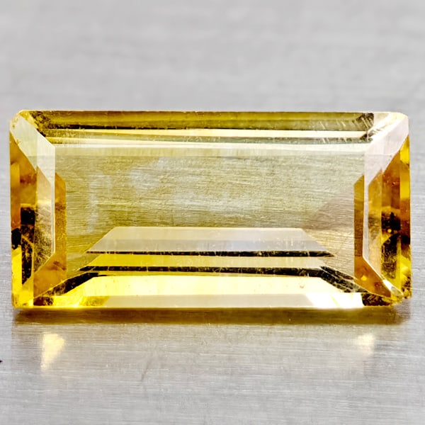 Natural Yellow Citrine 2.17 Ct. Clean Baguette Shape 12.1 x 6.1 Mm Gemstone From Brazil: Product ID: 801815032 Product Name: Natural Citrine Weight: 2.17 CT. Size: 12.1 x 6.1 x 3.8 MM. Shape: Baguette Color: Yellow Clarity:If Luster: Good Gems Origin: Brazil Treatment: Unheated Crystal St