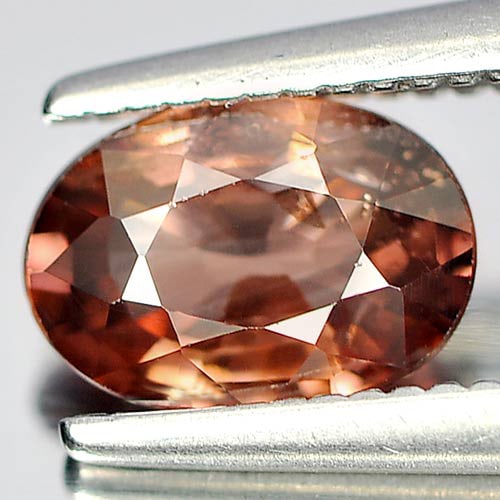 Natural Imperial Zircon 0.90 Ct. Oval Shape 6.9 x 4.9 Mm Gemstone From Cambodia: Product ID: 807730590 Product Name: Natural Zircon Weight: 0.90 CT. Size: 6.9 x 4.9 x 2.6 MM. Shape: Oval Color: Imperial Clarity:SI1 Luster: Good Gems Origin: Cambodia Treatment: Heated Crystal Struc