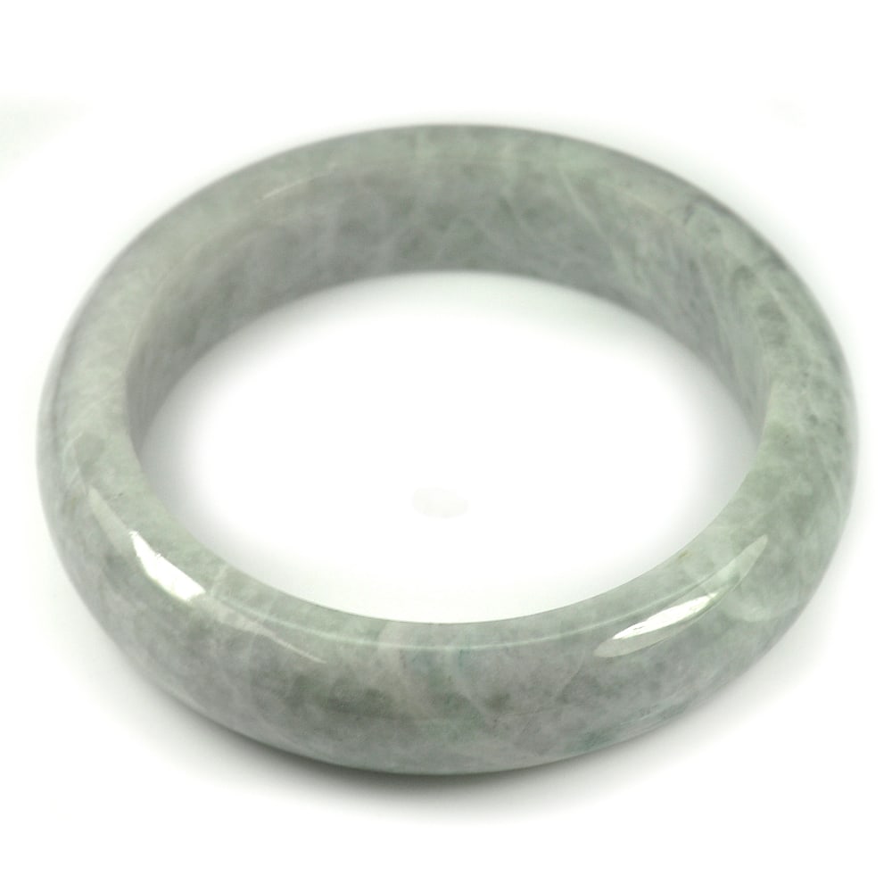 Natural Multi Color Jade Bangle 486.48 Ct. Diameter 62 Mm. Unheated Gemstone: Product ID: 819814934 Product Name: Natural Jade Weight: 486.48 CT. Size: 80 x 62 x 17 MM. Shape: Round Color: Multi-Color Clarity:Opaque Luster: Good Gems Origin: Thailand Treatment: Unheated Crystal