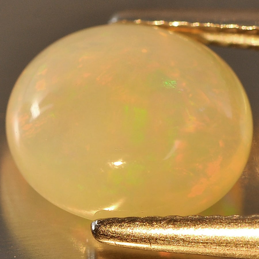 Natural Multi Color Opal 2.36 Ct. Oval Cabochon Shape 10 x 8.9 Mm Gemstone from Ethiopia (1 of 3)