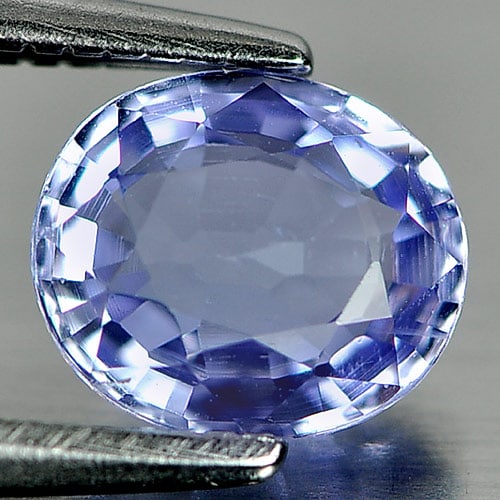 Natural Violetish Blue Tanzanite 0.94 Ct. VVS Oval Shape 6.8 x 5.8 Mm. Gemstone From Tanzania: Product ID: 807001422 Product Name: Natural Tanzanite Weight: 0.94 CT. Size: 6.8 x 5.8 x 3.1 MM. Shape: Oval Color: Violetish Blue Clarity:VVS Luster: Good Gems Origin: Tanzania Treatment: Heated Crys