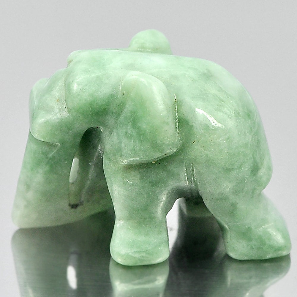 Natural Green Jade 53.21 Ct. Elephant Carving Shape 26 x 18 Mm Gemstone: Product ID: 819813082 Product Name: Natural Jade Weight: 53.21 CT. Size: 26 x 18 x 16 MM. Shape: Elephant Carving Color: Green Clarity:Opaque Luster: Good Gems Origin: Thailand Treatment: Unheated Cry