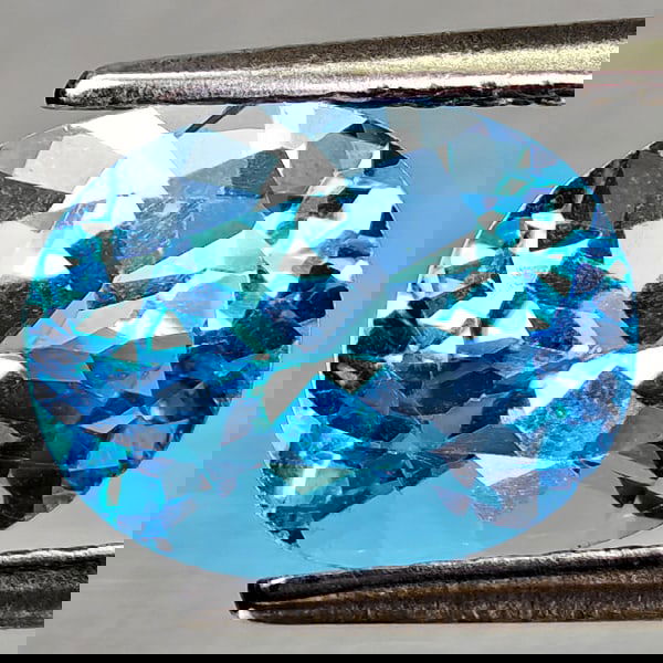 Natural Swiss Blue Topaz 2.35 Ct. Oval Shape 9 x 7.1 Mm Gemstone From Brazil: Product ID: 807168149 Product Name: Natural Blue Topaz Weight: 2.35 CT. Size: 9 x 7.1 x 5.2 MM. Shape: Oval Shape Color: Swiss Blue Clarity:VVS - VSI Luster: Good Gems Origin: Brazil Treatment: Treate