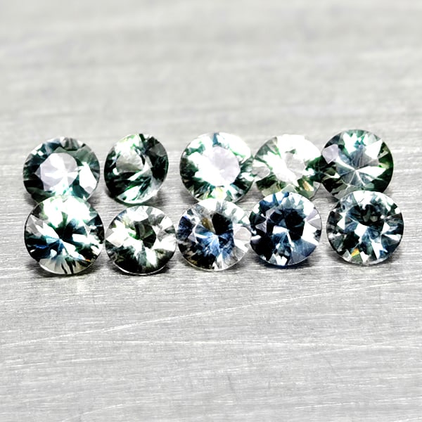 Natural Fancy Color Sapphire 0.42 Ct. 10 Pcs Round Diamand Cut 2.2 Mm Gemstones From Tanzania: Product ID: 806162283 Product Name: Natural Green Sapphire Weight: 0.42 CT. Size: 2.2 x 2.2 x 1.3 MM. Shape: Round Diamond Cut Color: Fancy Color Clarity:VSI Luster: Very Good Gems Origin: Tanzania Tr