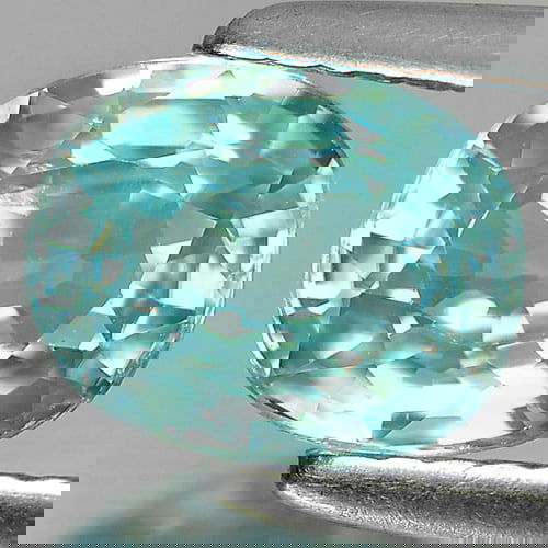 Natural Blue Zircon 1.86 Ct. Oval Shape 7.5 x 6.1 Mm. Gemstone From Cambodia: Product ID: 807720720 Product Name: Natural Zircon Weight: 1.86 CT. Size: 7.5 x 6.1 x 3.7 MM. Shape: Oval Color: Blue Clarity:SI Luster: Good Gems Origin: Cambodia Treatment: Heated Crystal Structure:
