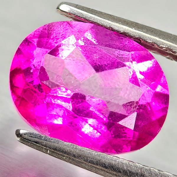 Natural Pink Topaz 2.44 Ct. Oval Shape 9.2 x 7.1 Mm Gemstone From Brazil: Product ID: 807168244 Product Name: Natural Topaz Weight: 2.44 CT. Size: 9.2 x 7.1 x 4.8 MM. Shape: Oval Color: Pink Clarity:VSI Luster: Good Gems Origin: Brazil Treatment: Treated Crystal Structure: