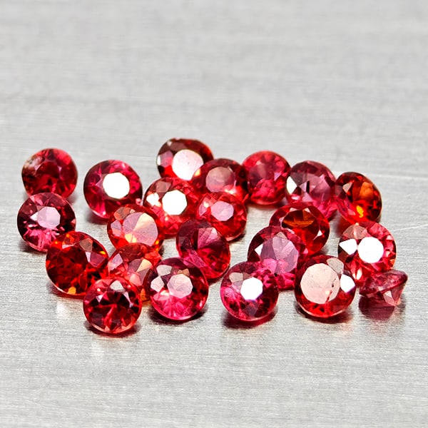 Natural Orangish Red Sapphire 0.76 Ct. 22 Pcs Round Diamond Cut 2 Mm Gemstones From Tanzania: Product ID: 806162472 Product Name: Natural Red Sapphire Weight: 0.76 CT. Size: 2 x 2 x 1.2 MM. Shape: Round Diamond Cut Color: Orangish Red Clarity:VSI Luster: Good Gems Origin: Tanzania Treatment: H