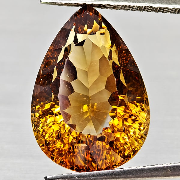 Natural Imperial Topaz 17.44 Ct. Pear Concave Cut 18.7 x 13 Mm Gemstone From Brazil: Product ID: 807168298 Product Name: Natural Topaz Weight: 17.44 CT. Size: 18.7 x 13 x 10.2 MM. Shape: Oval Concave Color: Imperial Clarity:VSI Luster: Good Gems Origin: Brazil Treatment: Unheated Crys