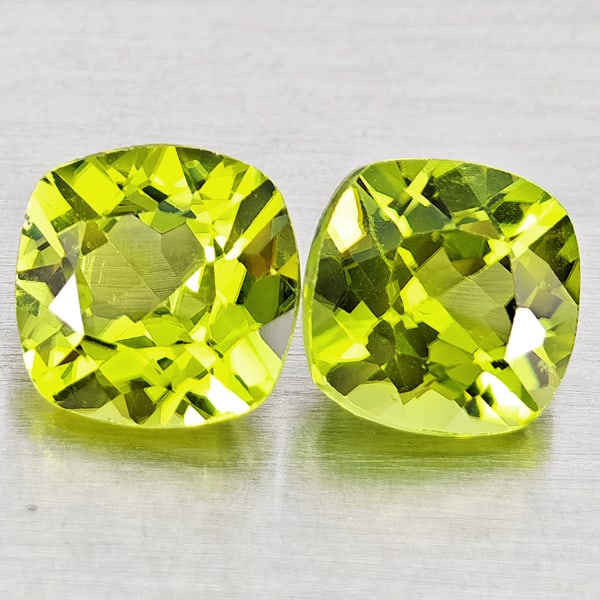 Natural Green Peridot 1.91 Ct. 2 Pcs Cushion Shape 6 Mm. Gemstones From Pakistan: Product ID: 805317414 Product Name: Natural Peridot Weight: 1.91 CT. Size: 6 x 6 x 3.6 MM. Shape: Cushion Shape Color: Green Clarity:VSI Luster: Good Gems Origin: Pakistan Treatment: Unheated Crystal