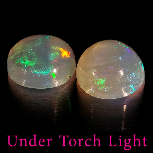 Natural Multi Color Opal 1.73 Ct. 2 Pcs Round Cabochon Shape 7.1 Mm Gemstones From Ethiopia: Product ID: 818728250 Product Name: Natural Opal Weight: 1.73 CT. Size: 7.1 x 7.1 x 3.4 MM. Shape: Round Cabochon Color: Multi-Color Clarity:Semi - Transparent Luster: Good Gems Origin: Ethiopia Treat
