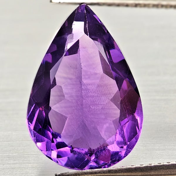 Natural Purple Amethyst 8.04 Ct. Pear Shape 16.1 x 11.2 Mm Gemstone From Brazil: Product ID: 800325424 Product Name: Natural Amethyst Weight: 8.04 CT. Size: 16.1 x 11.2 x 7.6 MM. Shape: Pear Shape Color: Purple Clarity:VSI Luster: Good Gems Origin: Brazil Treatment: Unheated Cryst