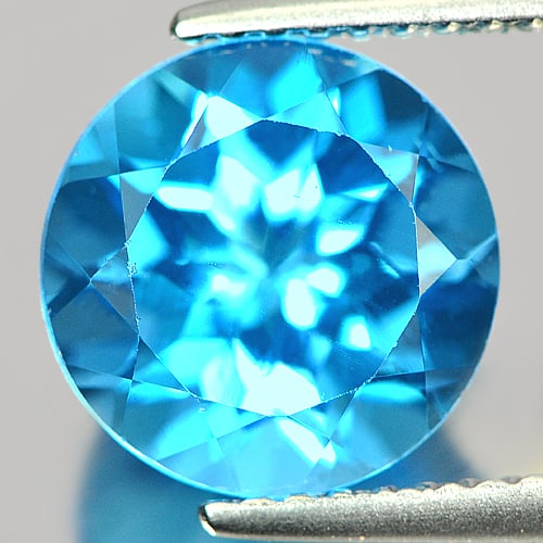 Natural Swiss Blue Topaz 3.51 Ct. Round Shape 9.2 Mm Gemstone From Brazil: Product ID: 807155817 Product Name: Natural Blue Topaz Weight: 3.51 CT. Size: 9.2 x 9.2 x 6.1 MM. Shape: Round Color: Swiss Blue Clarity:VSI Luster: Good Gems Origin: Brazil Treatment: Treated Crystal