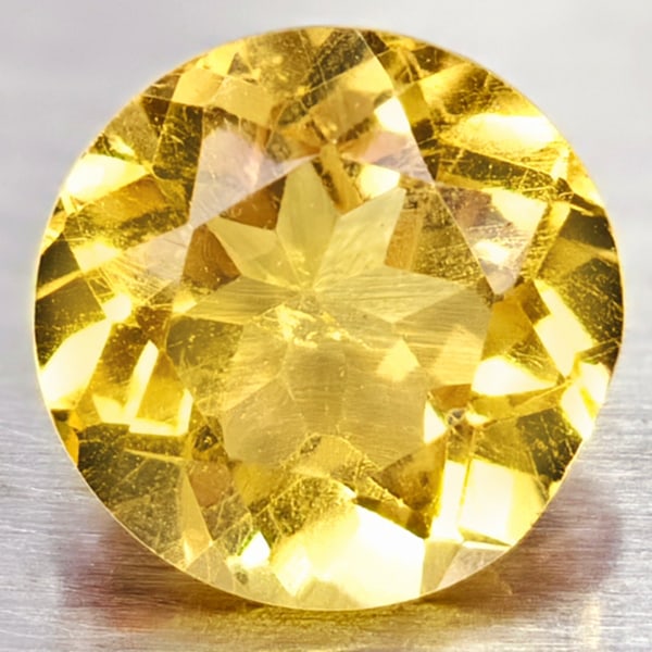Natural Yellow Citrine 1.23 Ct. Round Shape 7 Mm. Gemstone From Brazil: Product ID: 801813561 Product Name: Natural Citrine Weight: 1.23 CT. Size: 7 x 7 x 4.6 MM. Shape: Round Color: yellow Clarity:VVS Luster: Good Gems Origin: Barzil Treatment: Unheated Crystal Structure
