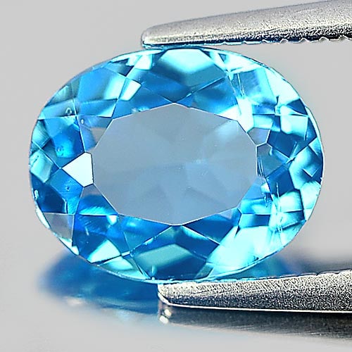 Natural Swiss Blue Topaz 1.93 Ct. Oval Shape 9 x 7.2 Mm Gemstone From Brazil: Product ID: 807154543 Product Name: Natural Blue Topaz Weight: 1.93 CT. Size: 9 x 7.2 x 4 MM. Shape: Oval Color: Swiss Blue Clarity:SI Luster: Good Gems Origin: Brazil Treatment: Treated Crystal Struc