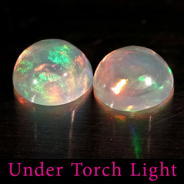 Natural Multi Color Opal 1.29 Ct. 2 Pcs Round Cabochon Shape 6.7 Mm Gemstones From Ethiopia: Product ID: 818728249 Product Name: Natural Opal Weight: 1.29 CT. Size: 6.7 x 6.7 x 3.4 MM. Shape: Round Cabochon Color: Multi-Color Clarity:Semi - Transparent Luster: Good Gems Origin: Ethiopia Treat