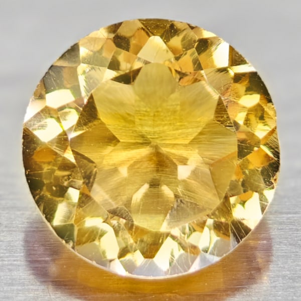 Natural Yellow Citrine 1.18 Ct. Round Shape 7 Mm. Gemstone From Brazil: Product ID: 801813562 Product Name: Natural Citrine Weight: 1.18 CT. Size: 7 x 7 x 4.2 MM. Shape: Round Color: yellow Clarity:VVS Luster: Good Gems Origin: Brazil Treatment: Unheated Crystal Structure