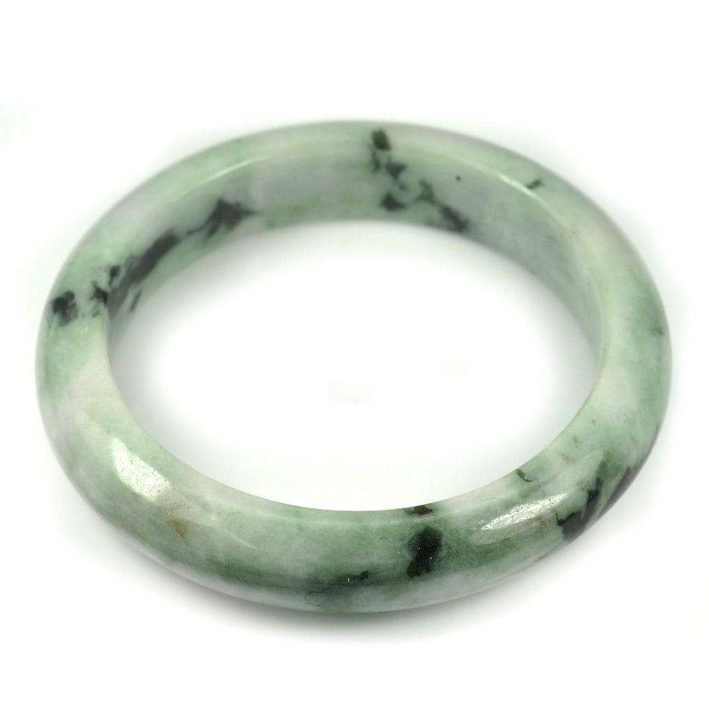 Natural Multi Color Green Jade Bangle 317.59 Ct. Gemstonen 75 x 57 x 13 Mm.: Product ID: 819814932 Product Name: Natural Jade Weight: 317.59 CT. Size: 75 x 57 x 13 MM. Shape: Round Color: Green Clarity:Opaque Luster: Good Gems Origin: Thailand Treatment: Unheated Crystal Struc