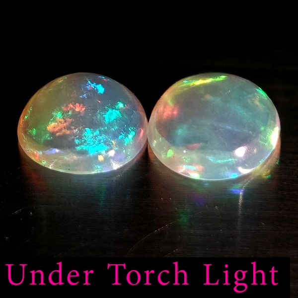 Natural Multi Color Opal 1.20 Ct. 2 Pcs Round Cabochon Shape 7.1 Mm Gemstones From Ethiopia: Product ID: 818728256 Product Name: Natural Opal Weight: 1.20 CT. Size: 7.1 x 7.1 x 2.6 MM. Shape: Round Cabochon Color: Multi-Color Clarity:Semi - Transparent Luster: Good Gems Origin: Ethiopia Treat