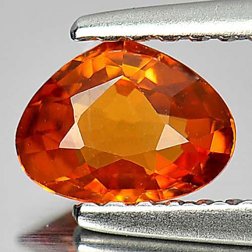 Natural Orange Spessartine Garnet 0.66 Ct. Pear Shape 6.4 x 4.8 Mm. Gemstone From Namibia: Product ID: 802934619 Product Name: Natural Spessartine Weight: 0.66 CT. Size: 6.4 x 4.8 x 2.6 MM. Shape: Pear Color: Orange Clarity:VSI Luster: Good Gems Origin: Namibia Treatment: Unheated Crystal S