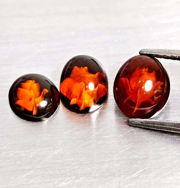 Natural Amber 1.22 Ct. 3 Pcs Flower Carving In Oval Cabochon Shape Gemstones From Poland: Product ID: 819091038 Product Name: Natural Amber Weight: 1.22 CT. Size: 7.8 x 6.1 x 3 to 7 x 5.9 x 3.3 MM. Shape: Oval Cabochon Color: Brown Yellow Clarity:Semi - Transparent Luster: Good Gems Origin