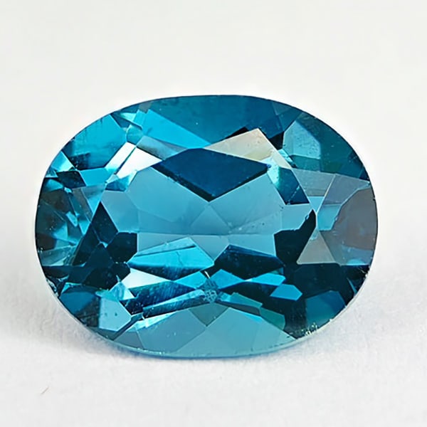 Natural London Blue Topaz 2.49 Ct. Oval Shape 9 x 7 Mm. Gemstone From Brazil: Product ID: 807167795 Product Name: Natural Blue Topaz Weight: 2.49 CT. Size: 9 x 7 x 4.9 MM. Shape: Oval Color: London Blue Clarity:VSI Luster: Good Gems Origin: Brazil Treatment: Treated Crystal Str