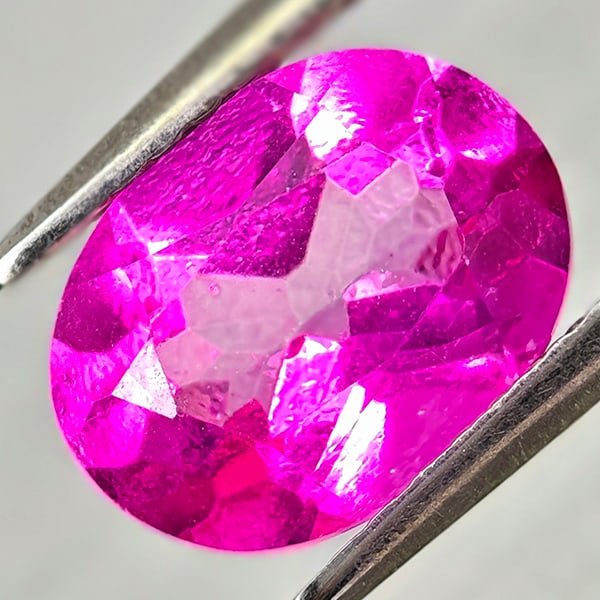Natural Pink Topaz 2.15 Ct. Oval Shape 9.1 x 6.9 Mm Gemstone From Brazil: Product ID: 807168246 Product Name: Natural Topaz Weight: 2.15 CT. Size: 9.1 x 6.9 x 4.5 MM. Shape: Oval Color: Pink Clarity:VSI Luster: Good Gems Origin: Brazil Treatment: Treated Crystal Structure: