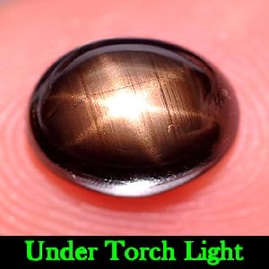 Natural Black Star Sapphire 6 Rays 2.27 Ct. Oval Cabochon Shape 8.1 x 6 Mm Gemstone From Thailand: Product ID: 806142543 Product Name: Natural Star Sapphire Weight: 2.27 CT. Size: 8.1 x 6 x 4.1 MM. Shape: Oval Cabochon Color: Black Clarity:Opaque Luster: Good 6 Rays Star Gems Origin: Thailand Treat