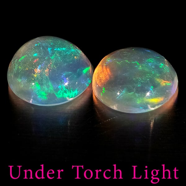 Natural Multi Color Opal 1.32 Ct. 2 Pcs Round Cabochon Shape 7 Mm Gemstones From Ethiopia: Product ID: 818728255 Product Name: Natural Opal Weight: 1.32 CT. Size: 7 x 7 x 3.3 MM. Shape: Round Cabochon Color: Multi-Color Clarity:Semi - Transparent Luster: Good Gems Origin: Ethiopia Treatment
