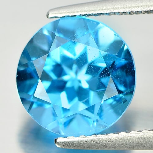 Natural Swiss Blue Topaz 3.32 Ct. Round Shape 8.9 Mm Gemstone From Brazil: Product ID: 807156243 Product Name: Natural Blue Topaz Weight: 3.32 CT. Size: 8.9 x 8.9 x 6.3 MM. Shape: Round Color: Blue Clarity:VSI Luster: Good Gems Origin: Brazil Treatment: Treated Crystal Struc