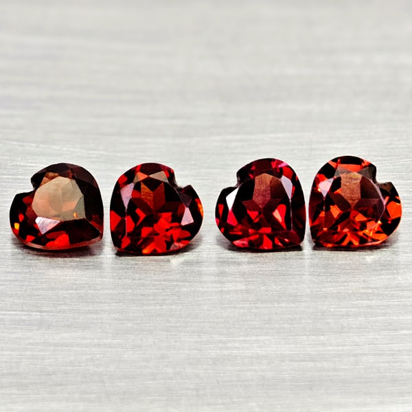 Natural Purplish Red Rhodolite Garnet 3.31 Ct. 4 Pcs Heart Shape 6.1 Mm Gemstones From Madagascar: Product ID: 802936657 Product Name: Natural Rhodolite Weight: 3.31 CT. Size: 6.1 x 6.1 x 2.8 MM. Shape: Heart Shape Color: Purplish Red Clarity:VSI Luster: Good Gems Origin: Madagascar Treatment: Unhe