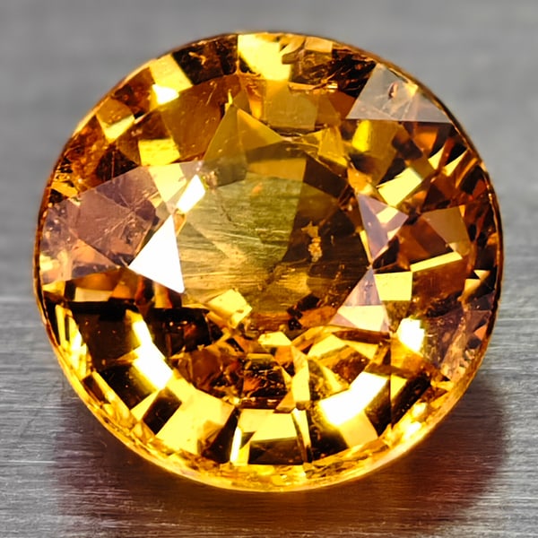 Natural Orange Spessartine Garnet 0.75 Ct. Round Shape 5.2 Mm Gemstone From Madagascar: Product ID: 102906941 Product Name: Natural Spessartine Weight: 0.75 CT. Size: 5.2 x 5.2 x 3 MM. Shape: Round Color: Fanta Orange Clarity:VVS Luster: Good Gems Origin: Madagascar Treatment: Unheated C