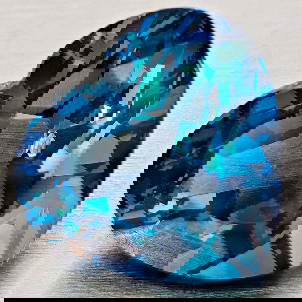Natural London Blue Topaz 3.22 Ct. Heart Shape 9.5 x 8.8 Mm Gemstone From Brazil: Product ID: 807168369 Product Name: Natural Blue Topaz Weight: 3.22 CT. Size: 9.5 x 8.8 x 5.4 MM. Shape: Heart Shape Color: London Blue Clarity:VVS - VSI Luster: Good Gems Origin: Brazil Treatment: Tr
