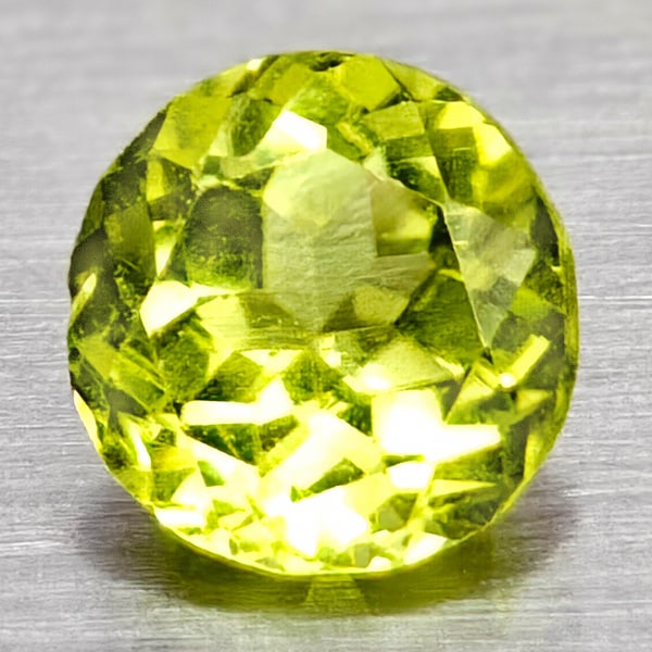 Natural Green Peridot 0.59 Ct. Oval Shape 5.2 x 4.9 Mm Gemstone From Pakistan: Product ID: 805317101 Product Name: Natural Peridot Weight: 0.59 CT. Size: 5.2 x 4.9 x 3.3 MM. Shape: Oval Color: Green Clarity:VSI Luster: Good Gems Origin: Pakistan Treatment: Unheated Crystal Struc
