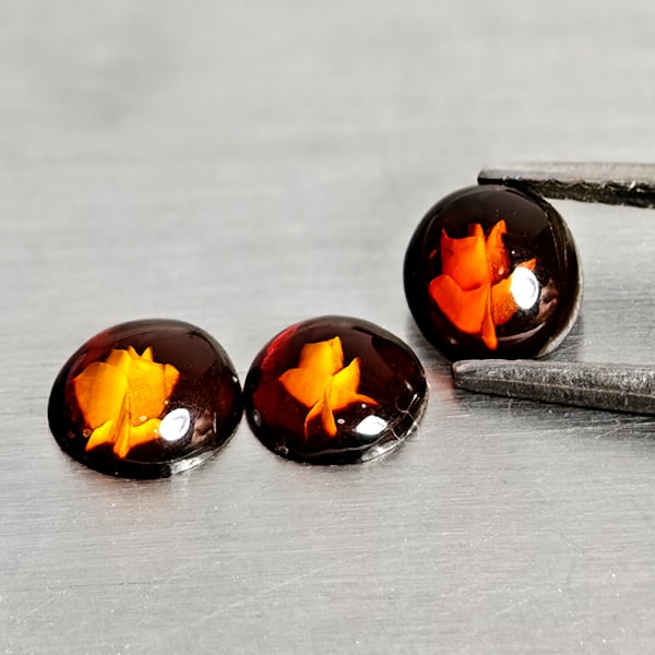 Natural Amber 0.58 Ct. 3 Pcs Flower Carving In Round Cabochon Gemstones From Poland: Product ID: 819091082 Product Name: Natural Amber Weight: 0.58 CT. Size: 5.9 x 5.9 x 2.1 to 5.5 x 5.5 x 1.8 MM. Shape: Round Cabochon Color: Brown Yellow Clarity:Semi - Transparent Luster: Good Gems O