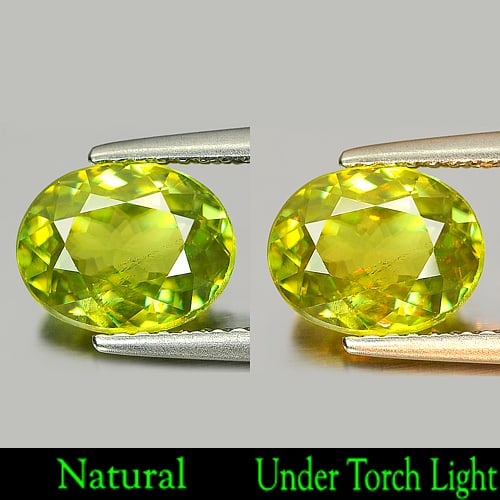 Natural Intense Yellowish Green Titanium Sphene With Rainbow Spark 2.09 Ct. Oval Shape 8.8 x 7 Mm: Product ID: 806505330 Product Name: Natural Sphene Weight: 2.09 CT. Size: 8.8 x 7 x 4.2 MM. Shape: Oval Color: Intense Yellowish Green Titanium With Rainbow Clarity:VSI Luster: Adamantine Gems Origin: