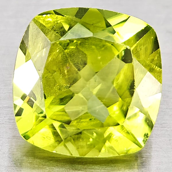 Natural Green Peridot 1.09 Ct. Cushion Shape 6.1 Mm Gemstones From Pakistan: Product ID: 805317357 Product Name: Natural Peridot Weight: 1.09 CT. Size: 6.1 x 6.1 x 3.8 MM. Shape: Cushion Shape Color: Green Clarity:VSI Luster: Good Gems Origin: Pakistan Treatment: Unheated Crys