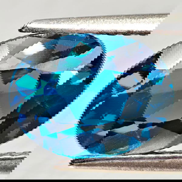 Natural London Blue Topaz 2.16 Ct. VVS Oval Shape 9 x 7 Mm. Gemstone from Brazil: Product ID: 807167889 Product Name: Natural Blue Topaz Weight: 2.16 CT. Size: 9 x 7 x 4.5 MM. Shape: Oval Color: London Blue Clarity:VVS Luster: Good Gems Origin: Brazil Treatment: Treated Crystal Str