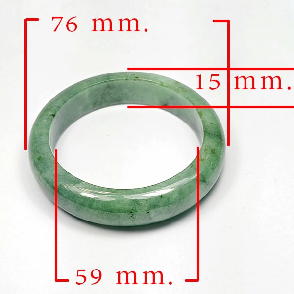 Natural Green Jade Bangle 390.16 Ct. Diameter 59 Mm. Unheated Gemstone: Product ID: 819816009 Product Name: Natural Jade Weight: 390.16 CT. Size: 76 x 59 x 15 MM. Shape: Bangle Round Cabochon Color: Multi-Color Green Clarity:Opaque Luster: Good Gems Origin: Thailand Treat