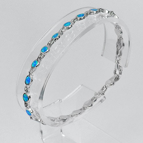 925 Sterling Silver Bracelet Jewelry with Blue Created Opal Length 7.5 Inch.: Product ID: 280160025 Product Type: 925 Sterling Silver Fine Jewelry Jewelry Weight: 7.58 Grams. Gemstones Color: Multi-Color Metal: Solid Silver 92.5%. Gemstone Detail: Average Range 7.58 - 7.98 Gram