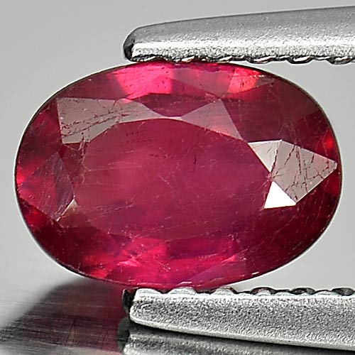 Natural Pinkish Red Ruby 0.91 Ct. Oval Shape 7 x 4.9 Mm Gemstone from Madagascar: Product ID: 805933258 Product Name: Natural Ruby Weight: 0.91 CT. Size: 7 x 4.9 x 2.8 MM. Shape: Oval Color: Pinkish Red Clarity:VSI Luster: Good Gems Origin: Madagascar Treatment: Heated (Lead-glass