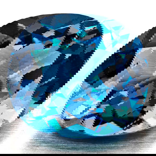 Natural London Blue Topaz 4.65 Ct. Cushion Shape 10.6 x 9.4 Mm Gemstone from Brazil: Product ID: 807168332 Product Name: Natural Blue Topaz Weight: 4.65 CT. Size: 10.6 x 9.4 x 6.2 MM. Shape: Cushion Shape Color: London Blue Clarity:VVS - VSI Luster: Good Gems Origin: Brazil Treatment: