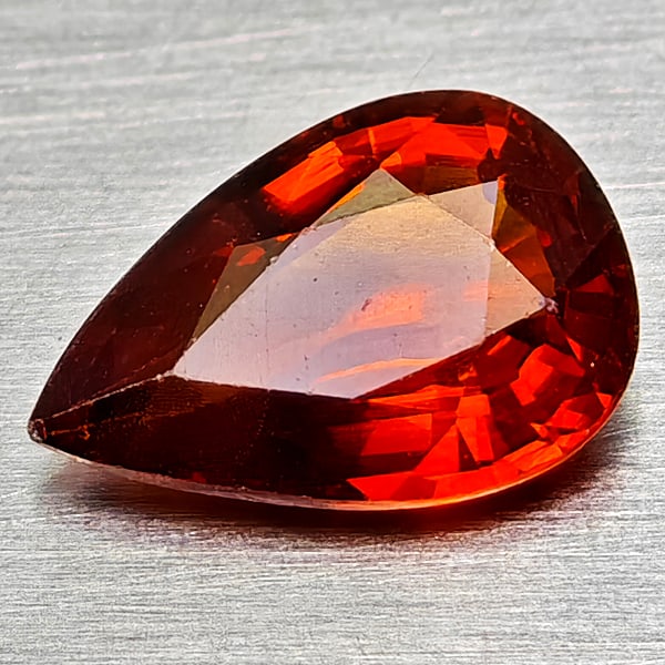 Natural Orangish Red Spessartine Garnet 0.77 Ct. Pear Shape 7.1 x 4.8 Mm. Gemstone From Namibia: Product ID: 802936933 Product Name: Natural Spessartine Weight: 0.77 CT. Size: 7.1 x 4.8 x 2.7 MM. Shape: Pear Shape Color: Orangish Red Clarity:VSI Luster: Good Gems Origin: Namibia Treatment: Unheat