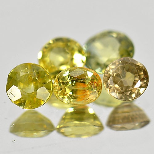 Natural Yellow Sapphire 1.80 Ct. Mix Shape 5 Pcs. Gemstone From Thailand: Product ID: 806152124 Product Name: Natural Yellow Sapphire Weight: 1.80 CT. Size: 4.7 x 2.2 MM. Shape: Mix Shape Color: Yellow Clarity:SI1 Luster: Good Gems Origin: Thailand Treatment: Heated Crystal