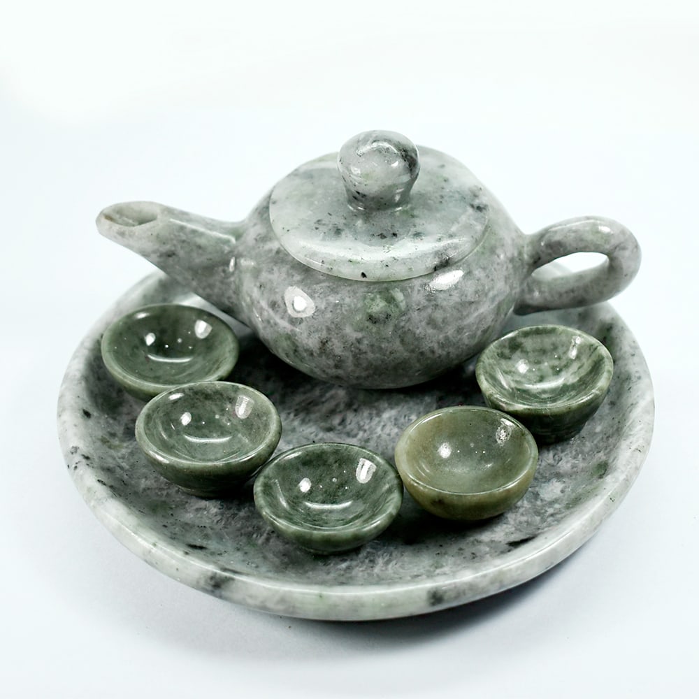 Natural Burmese Jade 2075 Ct. Kettle Tea Drink set Carving Beautiful Design: Product ID: 818102553 Product Name: Natural Gemstones Weight: 2075.00 CT. Size: 125 x 125 x 65 MM. Shape: None Color: Green Clarity:Opaque Luster: Good Gems Origin: Burma Treatment: Unheated Crystal S