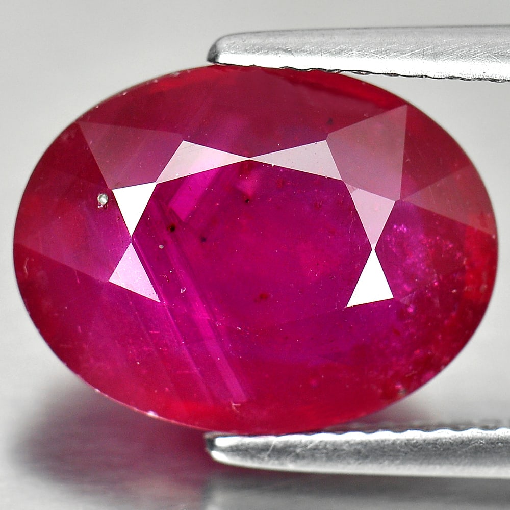 Natural Ruby Purplish Pink 7.48 Ct. Oval Shape 13.9 x 10.7 Mm. Gemstone From Mozambique: Product ID: 805925413 Product Name: Natural Ruby Weight: 7.48 CT. Size: 13.9 x 10.7 x 5 MM. Shape: Oval Color: Pink Clarity:VSI Luster: Good Gems Origin: Mozambique Treatment: Heated Lead-glass fillin