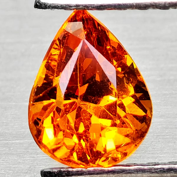Natural Orangish Red Spessartine Garnet 0.98 Ct. Pear Shape 6.5 x 5 Mm Gemstone From Namibia: Product ID: 802936803 Product Name: Natural Spessartine Weight: 0.98 CT. Size: 6.5 x 5 x 4 MM. Shape: Pear Shape Color: Orangish Red Clarity:VSI Luster: Good Gems Origin: Namibia,Africa Treatment: Unh