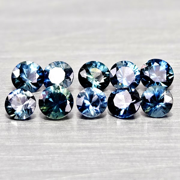 Natural Fancy Color Sapphire 0.83 Ct. 10 Pcs Round Diamand Cut Gemstones From Tanzania: Product ID: 806162195 Product Name: Natural Green Sapphire Weight: 0.83 CT. Size: 2.7 x 2.7 x 1.6 to 2.5 x 2.5 x 1.7 MM. Shape: Round Diamond Cut Color: Fancy Color Clarity:VSI Luster: Very Good Gems 